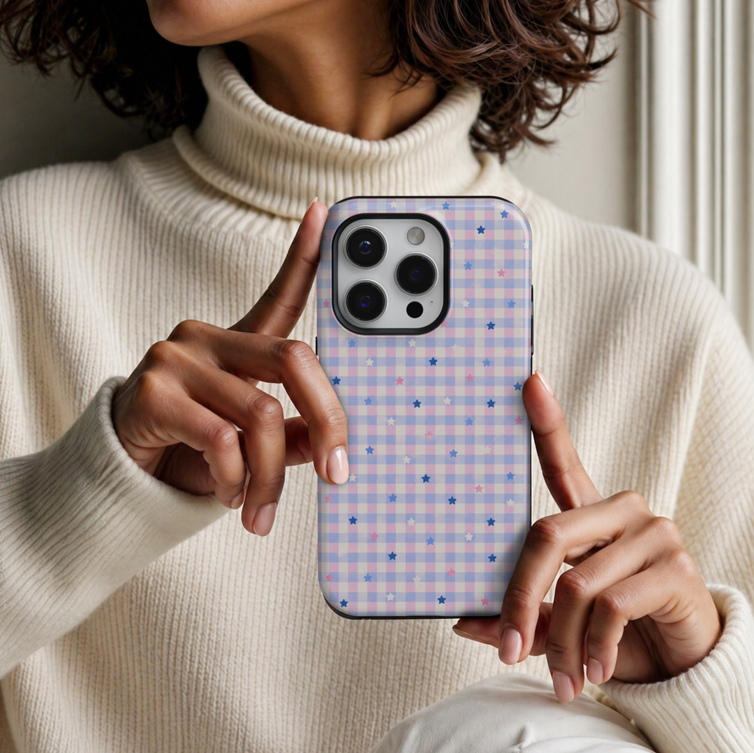 CASELIX Pastel Star Gingham iPhone 18 Pro Max tough phone case featuring a soft pink, baby blue, lavender, and ivory gingham checkered pattern decorated with scattered pink, white, and blue stars. A cute pastel aesthetic phone case for women with a playful, trendy, feminine design and glossy printed finish.