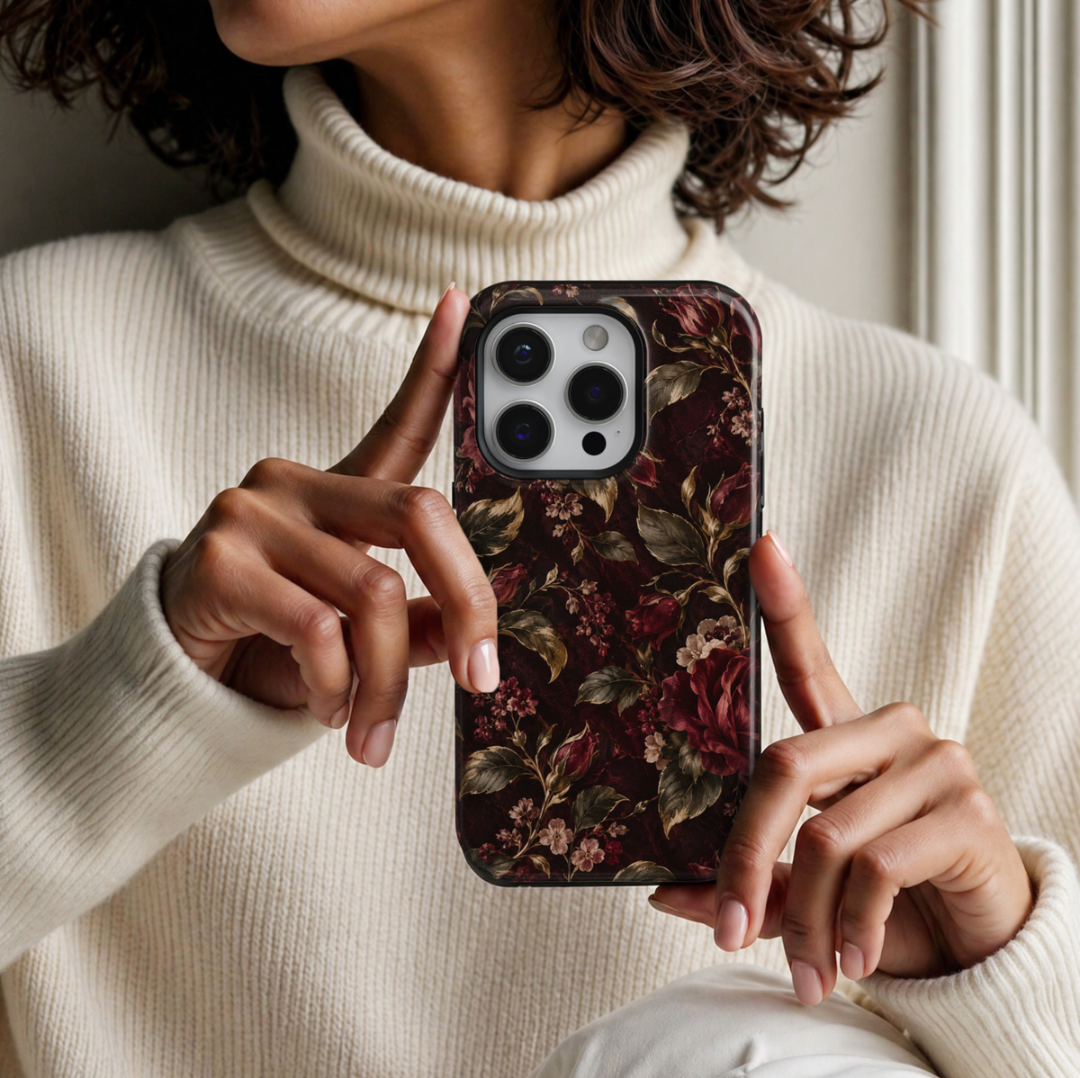 Midnight Roses iPhone 18 Pro Max tough phone case featuring deep burgundy red roses, delicate blush blossoms, antique gold foliage and romantic floral details against a dramatic dark wine background with a glossy printed finish.