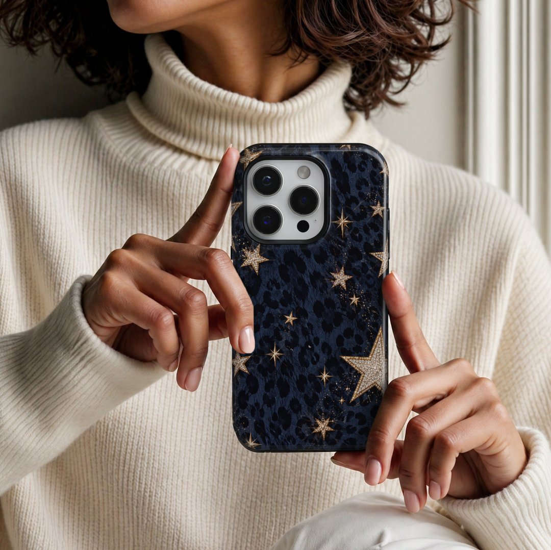 CASELIX Midnight Leopard Stars iPhone Tough MagSafe protective phone case featuring a luxurious midnight navy-blue and black leopard print pattern adorned with sparkling gold stars, diamond-inspired celestial embellishments, and delicate golden glitter accents. The elegant design combines bold animal print textures with shimmering champagne-gold star motifs, creating a glamorous celestial aesthetic. Stylish blue leopard print iPhone case with a glossy printed finish, trendy starry night design, built-in Mag