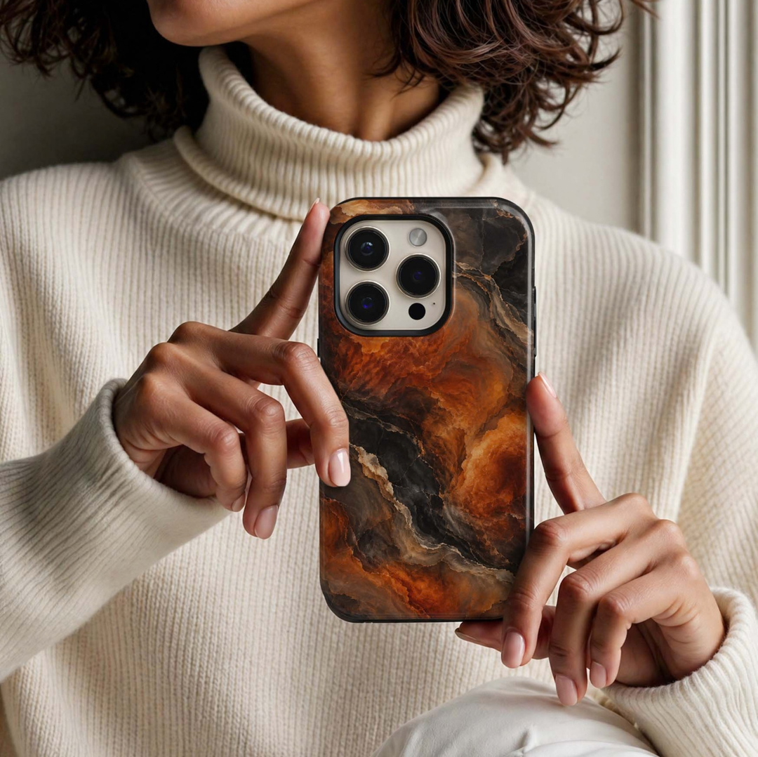 Ember Onyx Tough iPhone Case featuring molten burnt orange, amber and copper marble flowing through smoky black, espresso and taupe natural stone.