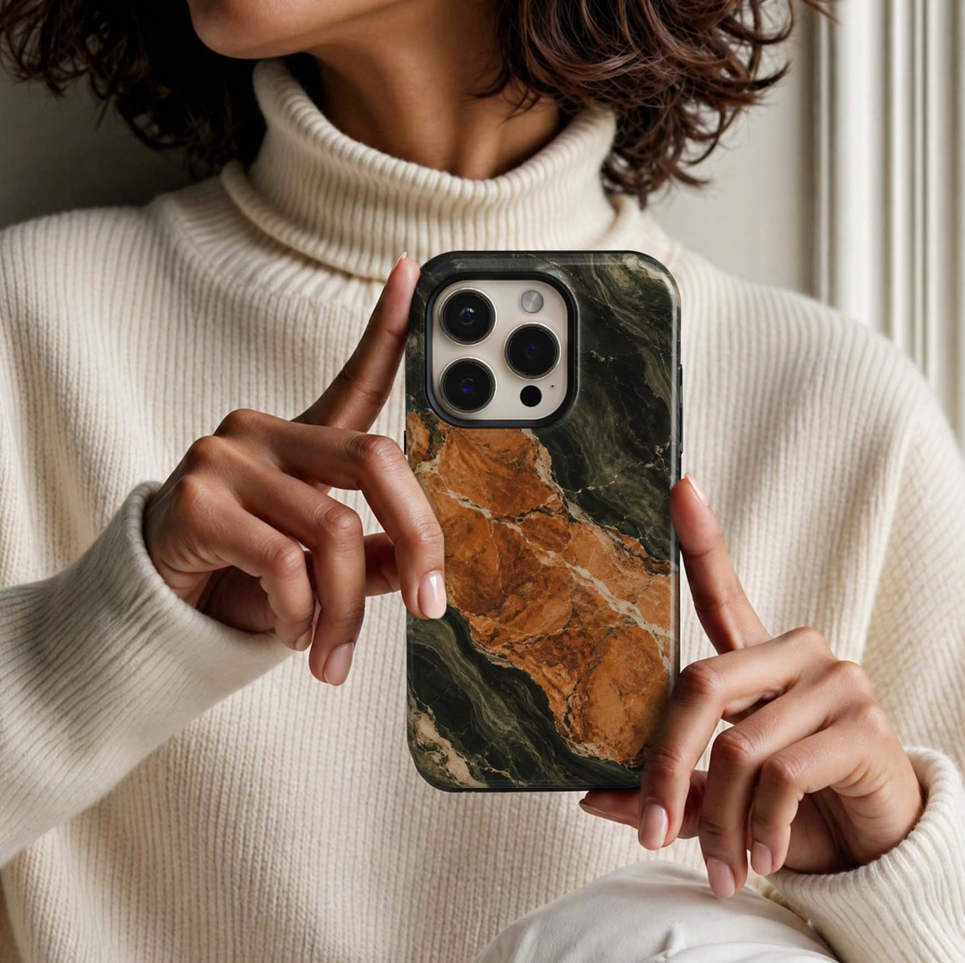 Olive Ember Tough iPhone Case featuring rich burnt orange marble surrounded by deep olive and forest green stone with creamy natural veining.