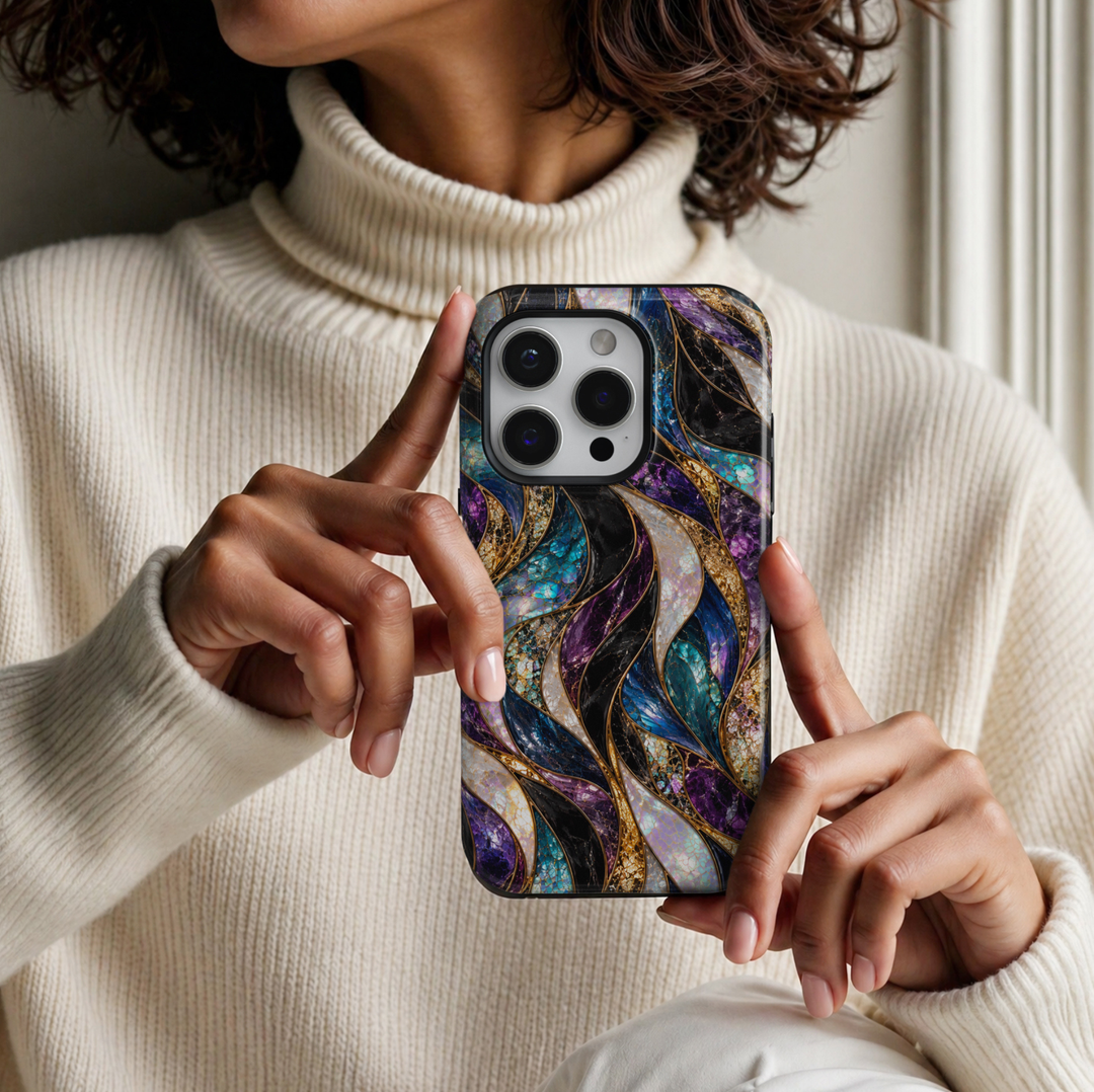 CASELIX Mystic Opal Waves iPhone Tough MagSafe protective phone case featuring a luxurious abstract stained-glass mosaic pattern with flowing, ribbon-like waves in rich amethyst purple, brilliant sapphire blue, luminous turquoise, midnight black, champagne gold, and iridescent opal white. The captivating design showcases gracefully intertwined curved panels filled with intricate cracked-glass textures, shimmering mother-of-pearl-inspired surfaces, and vibrant jewel-toned mosaic details. Delicate metallic go