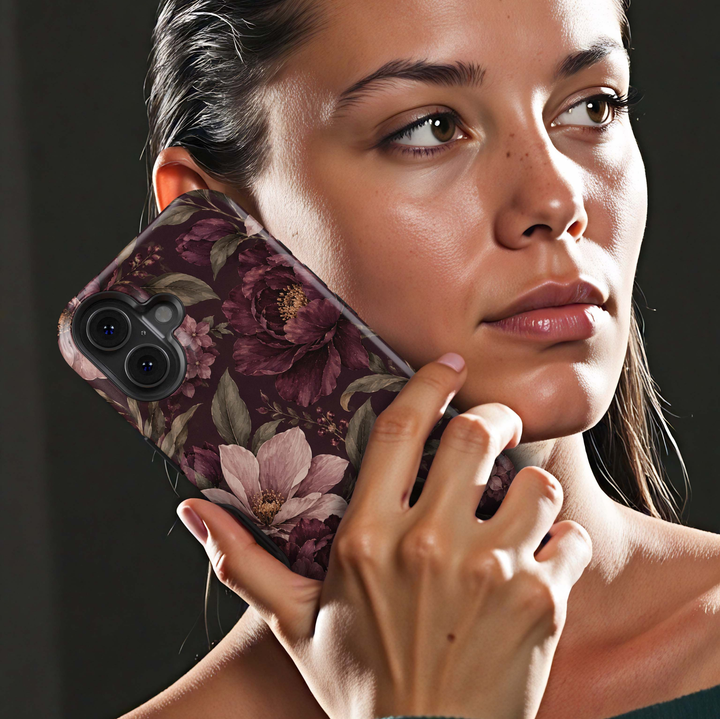 Merlot Garden iPhone 18 Pro Max MagSafe case featuring oversized merlot, burgundy and dusty blush flowers with muted olive foliage on a dark wine background, an elegant moody botanical tough iPhone 18 Pro floral phone case with MagSafe compatibility.