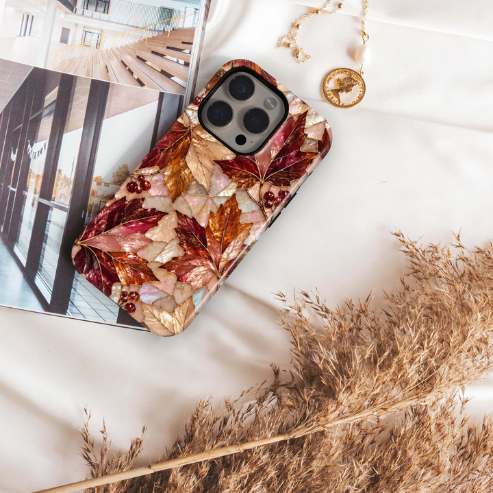Autumn Opal Samsung Galaxy S26 Ultra case featuring pearlescent maple leaves in burgundy, copper, bronze, champagne, blush and ivory with red berries and gold detailing, a luxurious stained-glass-inspired tough Samsung Galaxy fall phone case.