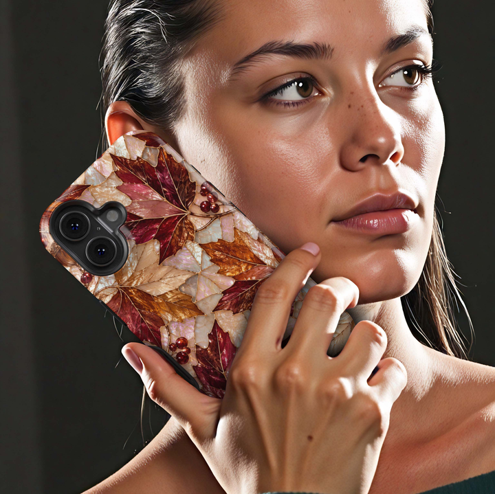 Autumn Opal iPhone 18 Pro Max MagSafe case featuring pearlescent autumn maple leaves in burgundy, copper, bronze, champagne and ivory with red berries and gold detailing, a luxurious stained-glass-inspired tough iPhone 18 Pro fall phone case with MagSafe compatibility.