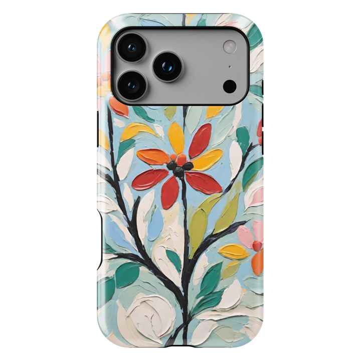 Painterly floral iPhone case featuring textured oil painting flowers in red, yellow, green, and blue with expressive brushstrokes.