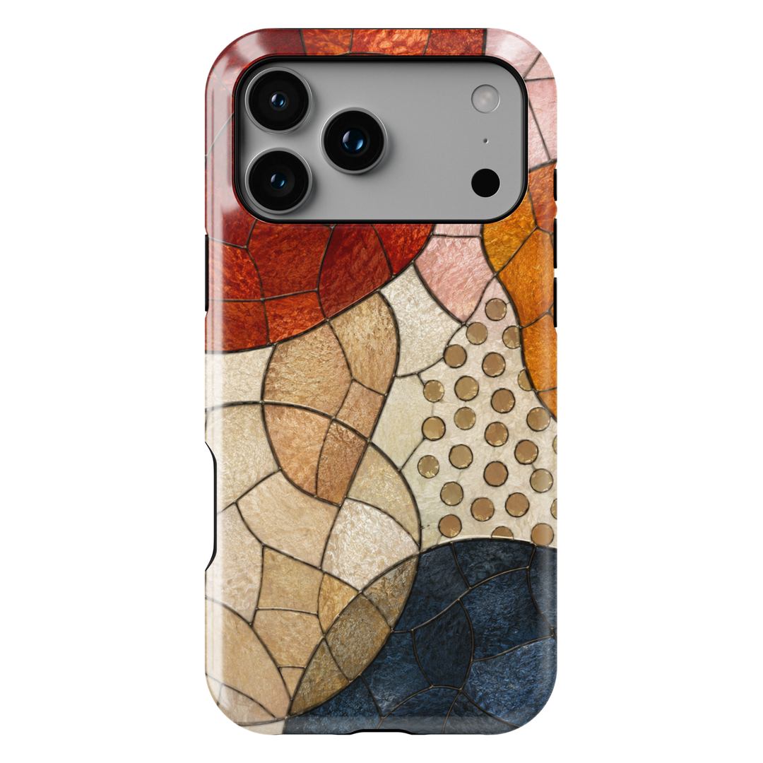Modern abstract iPhone case featuring neutral geometric mosaic shapes in terracotta, cream, caramel, and navy tones.