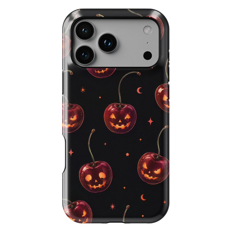 Black Halloween iPhone case with cherry red jack-o-lantern pumpkins, glowing faces, crescent moons and stars.