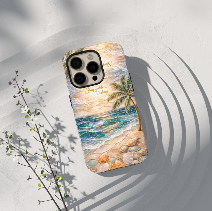Beach aesthetic phone case featuring ocean sunset, palm tree, seashells and stay golden quote protective tough case for iPhone and Samsung Galaxy