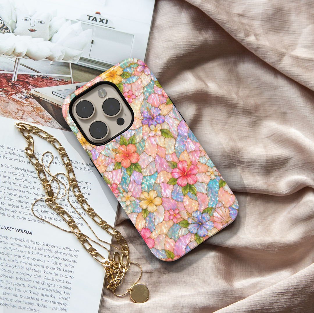 Pastel floral iPhone 17 Pro Max case with iridescent mosaic pattern and colorful flowers, aesthetic MagSafe tough case.
