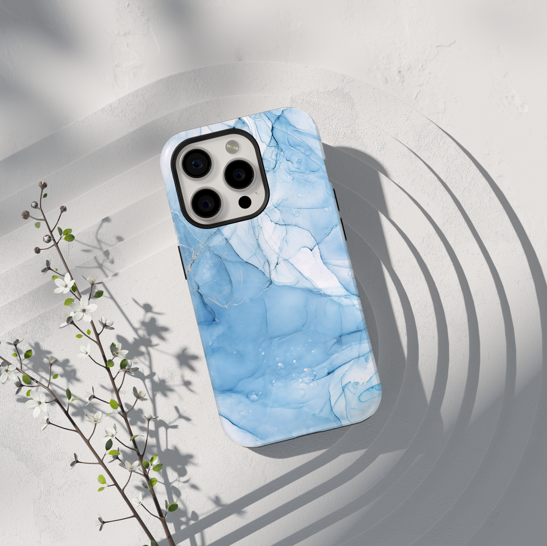 Personalized blue marble phone case with gold accents and custom name design