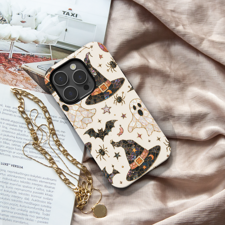Enchanted Witch Samsung Galaxy case featuring stained glass witch hats, pearl ghosts, bats, spiders, crescent moons and stars.