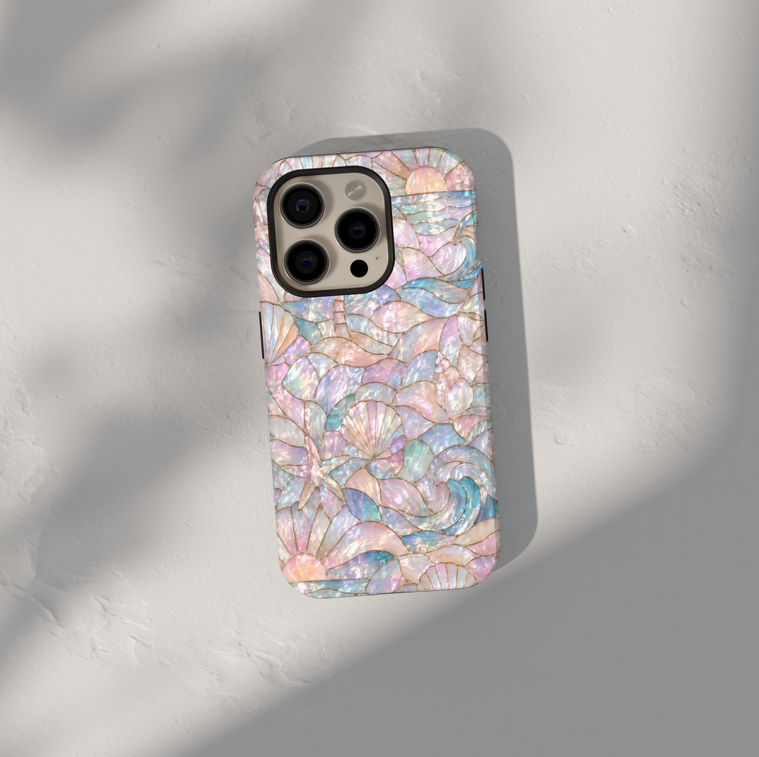 Iridescent ocean beach iPhone 17 Pro Max case with seashells, waves, and pastel pearl mosaic design, MagSafe tough case.
