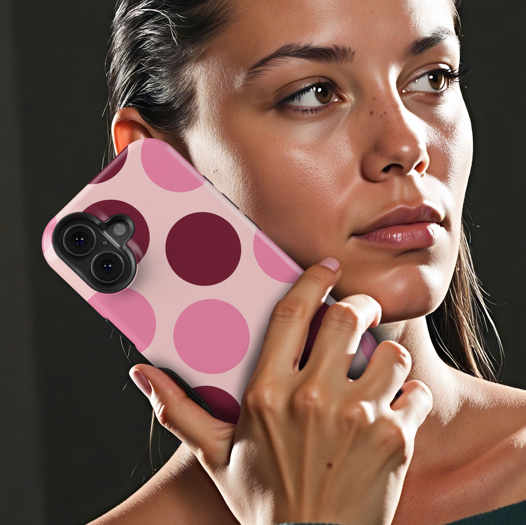 Double Take pink polka dot iPhone 18 Pro Max MagSafe case featuring oversized blush pink, rosy pink and deep burgundy circles on a pale pink background, a retro preppy tough iPhone 18 Pro phone case with feminine girly aesthetic, bold circle pattern, protective design and MagSafe compatibility.