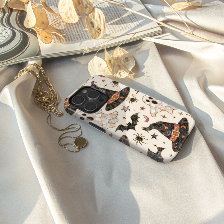 Enchanted Witch Samsung Galaxy case featuring stained glass witch hats, pearl ghosts, bats, spiders, crescent moons and stars.