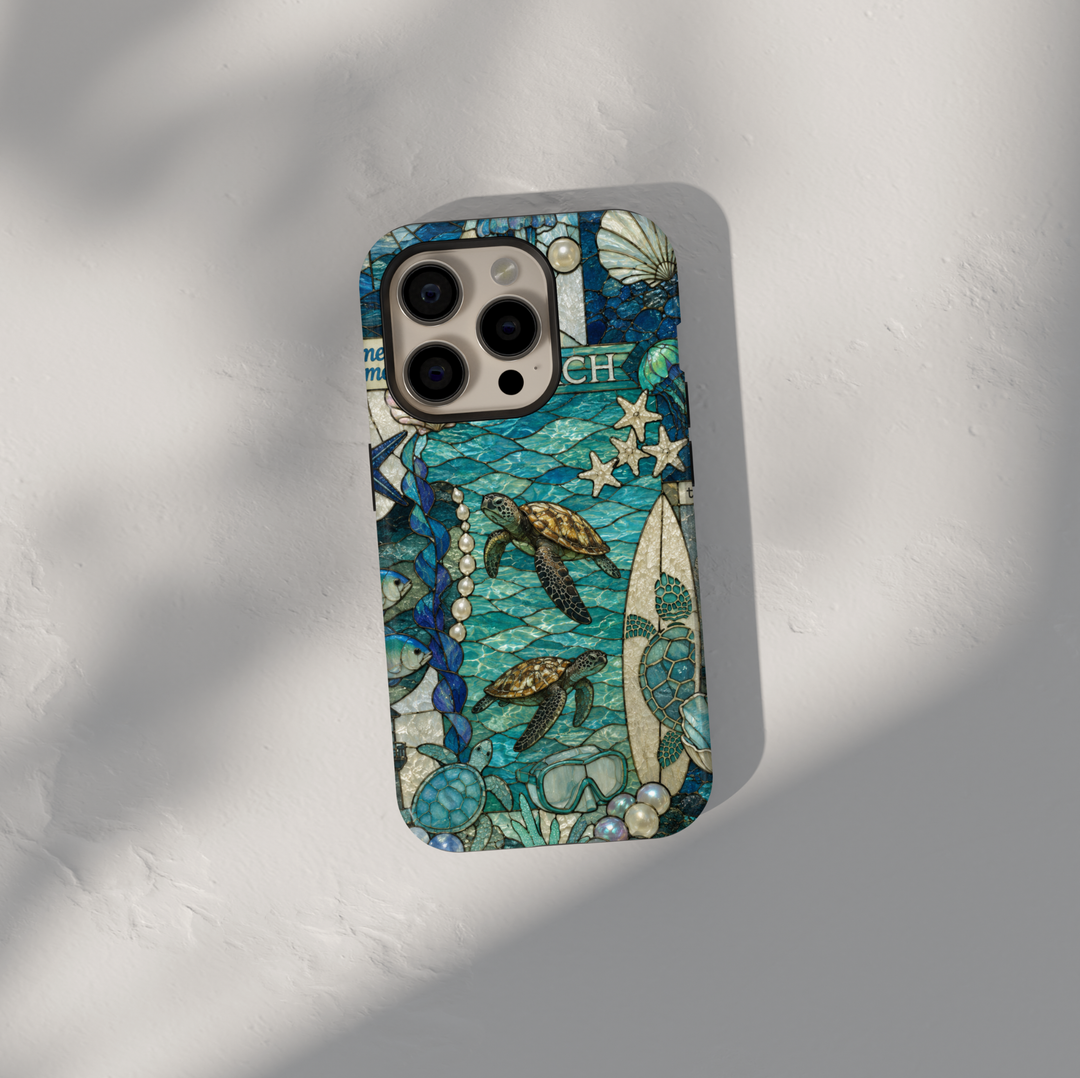 Sea turtle coastal iPhone 17 Pro Max case featuring ocean waves, surfboards, shells, pearls, and tropical beach artwork.