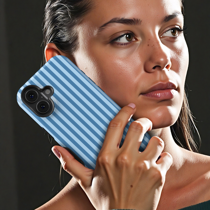 Blue Routine blue striped iPhone 18 Pro Max MagSafe case featuring vertical powder blue and denim blue stripes, a clean preppy minimalist tough iPhone 18 Pro phone case with light blue aesthetic, classic striped design, protective style and MagSafe compatibility.