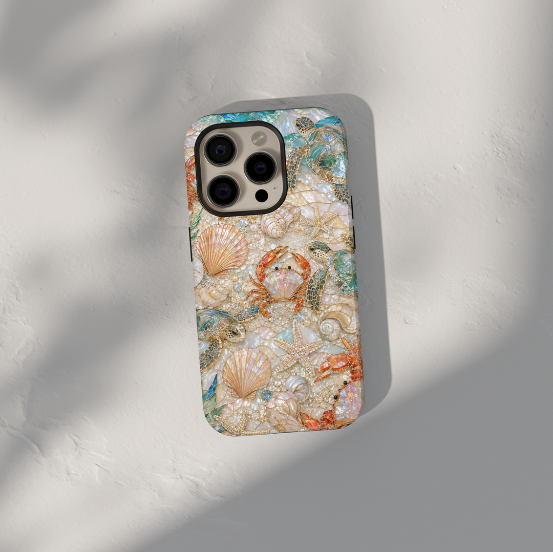 Beach-themed iPhone case featuring sea turtles, seashells, starfish, crabs, pearl accents, and coastal ocean-inspired artwork.