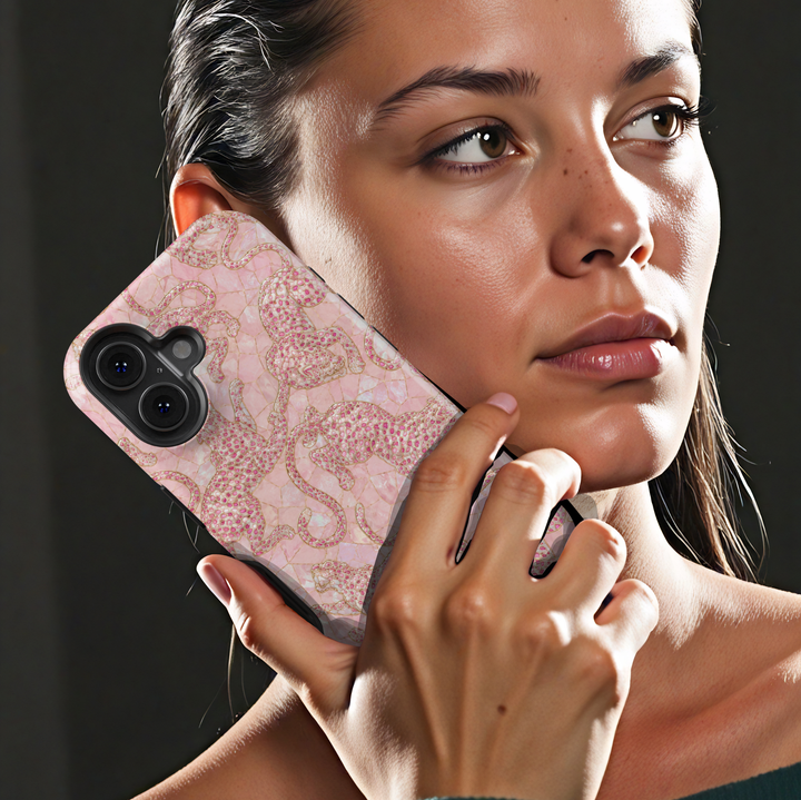 Blush Prowl iPhone case featuring pink leopards on a soft blush pearl-inspired mosaic background with delicate gold details.