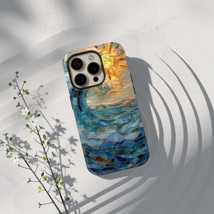 Ocean inspired stained glass art phone case with layered blue waves and golden sun on a protective iPhone and Samsung Galaxy phone case for women