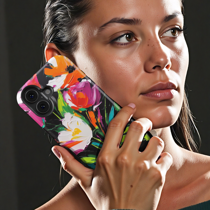 Modern abstract floral iPhone case featuring vibrant colorful flowers with white blossoms on a dark artistic background.