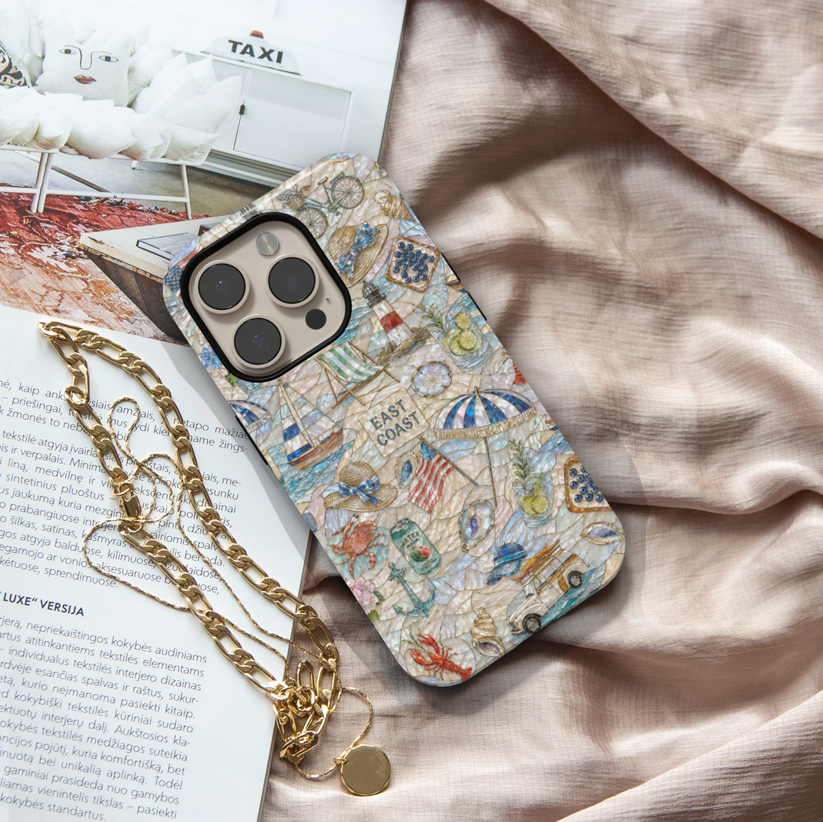 Beach-themed iPhone case featuring turquoise ocean waves, tropical palm trees, seashells, pearls, sandy shoreline, and coastal sunset artwork.