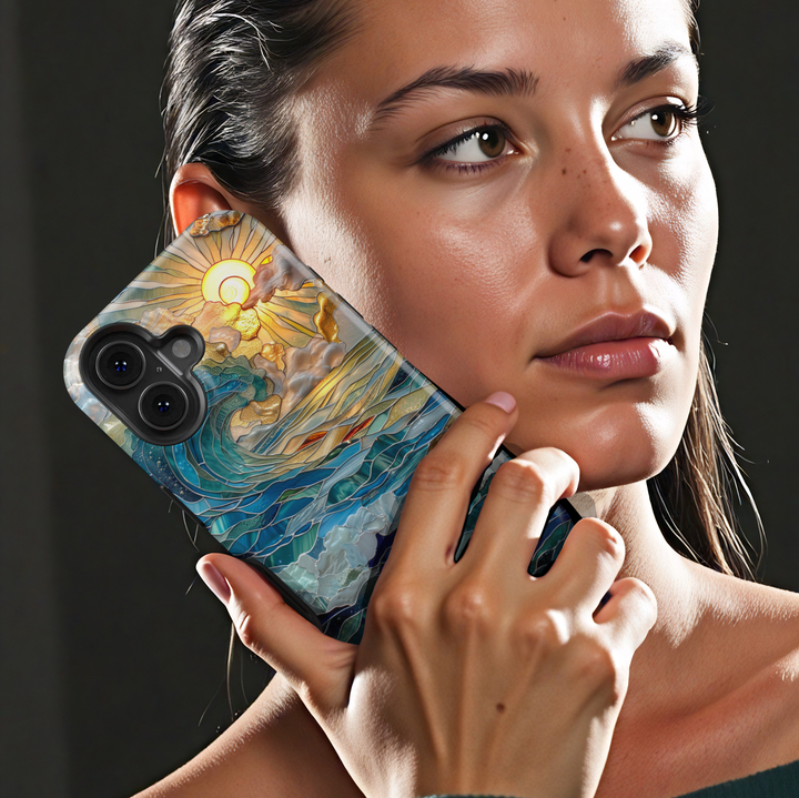 Ocean inspired stained glass art phone case with layered blue waves and golden sun on a protective iPhone and Samsung Galaxy phone case for women