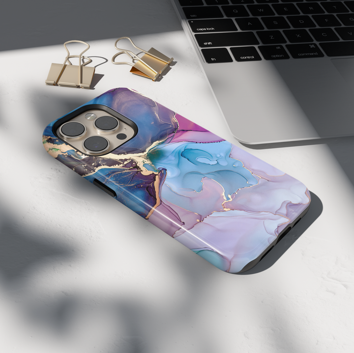 Personalized blue marble phone case with gold accents and custom name design