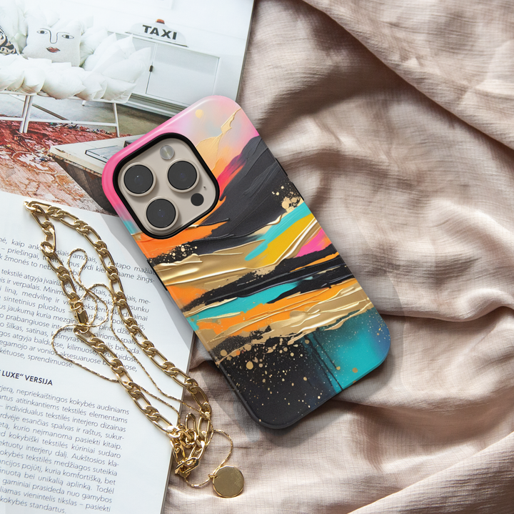 Modern landscape iPhone case featuring turquoise mountains, a reflective lake, and a colorful sunset sky.