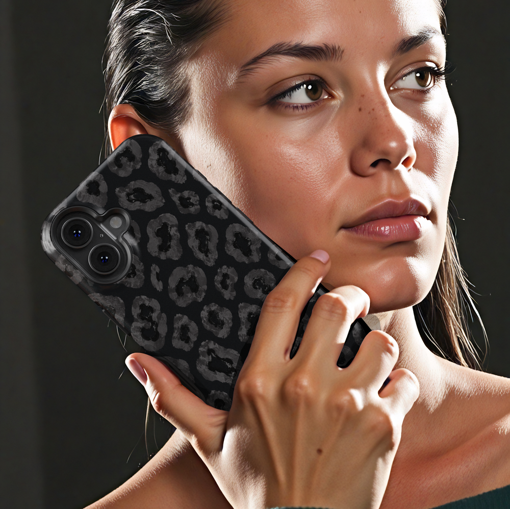 Black iPhone case leopards, botanical details and a luxurious black background.
