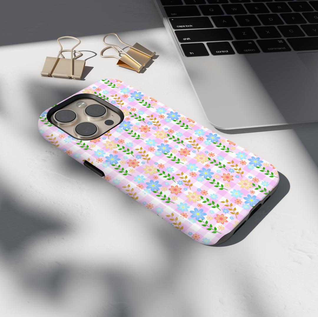 Pink gingham iPhone tough case with pastel flowers and green vines in a cute cottagecore pattern