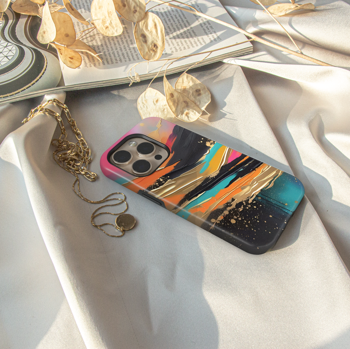 Modern landscape iPhone case featuring turquoise mountains, a reflective lake, and a colorful sunset sky.