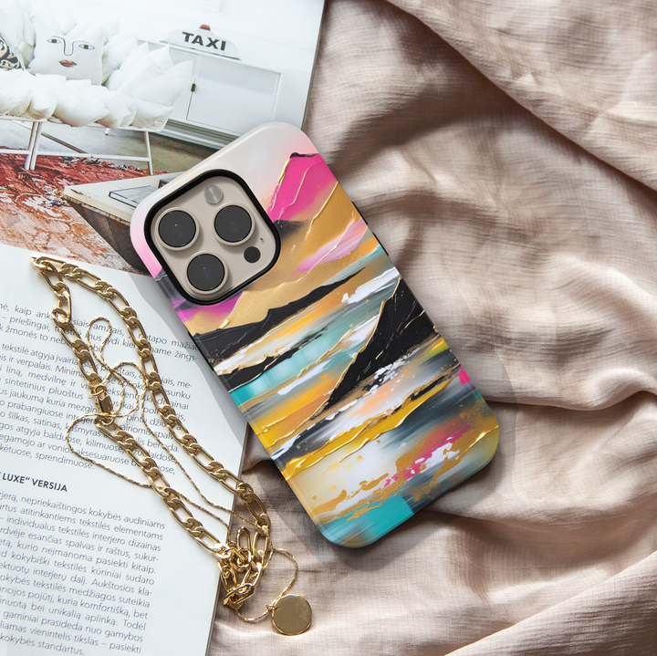 Modern landscape iPhone case featuring turquoise mountains, a reflective lake, and a colorful sunset sky.