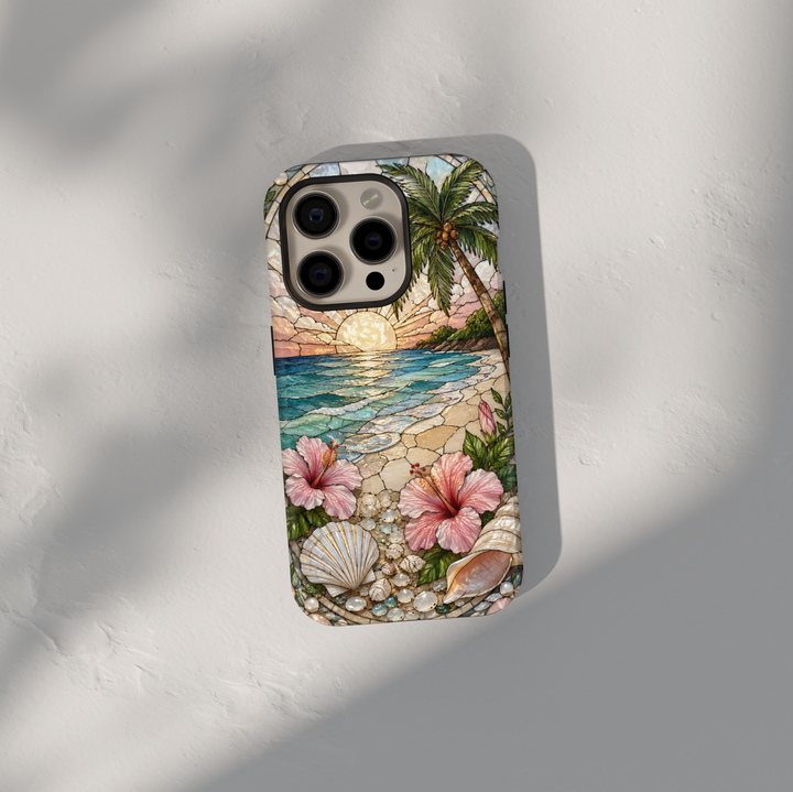 Tropical beach sunset iPhone 17 Pro Max case with hibiscus flowers, seashells, ocean waves, and pearl-inspired details.