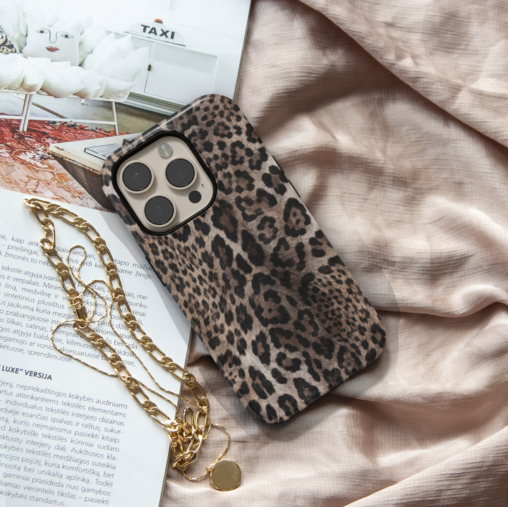 Smoky Leopard iPhone case featuring realistic taupe, brown, charcoal and black leopard animal print.