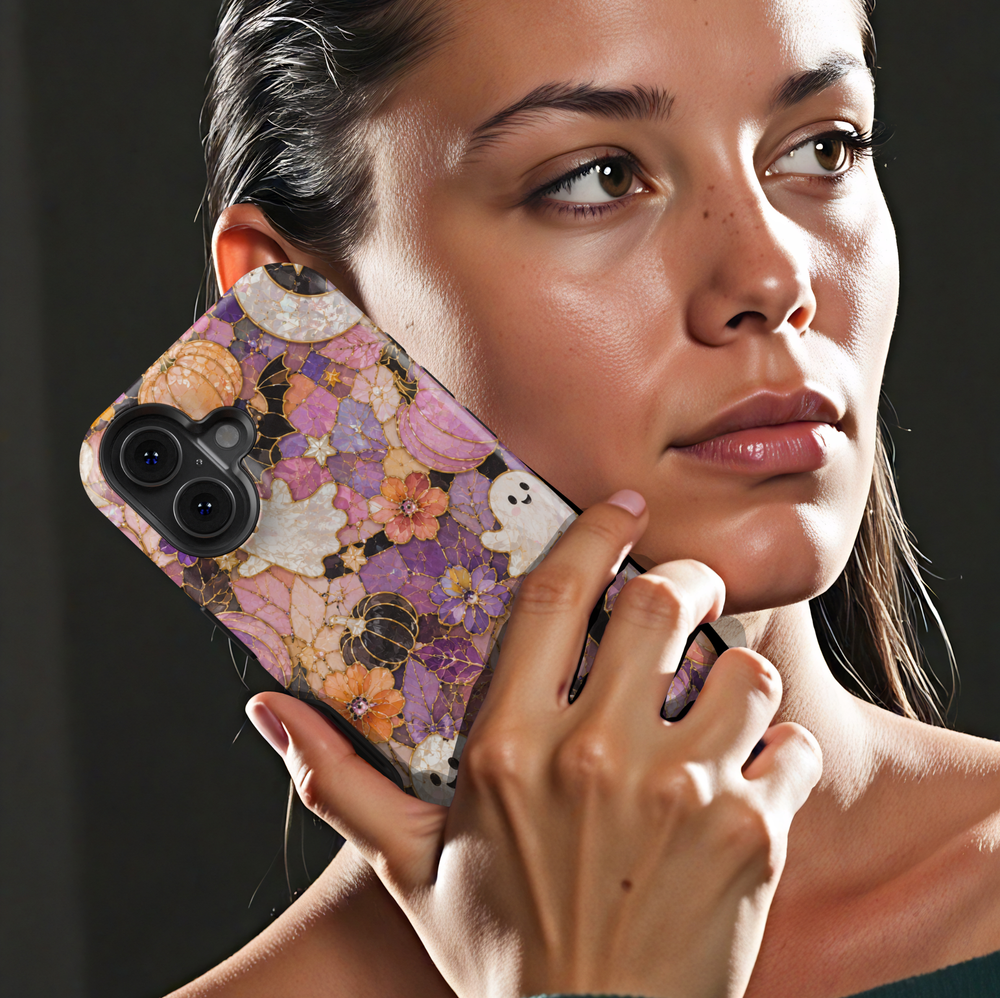 Floral Halloween iPhone case with pearl ghosts, bats, pumpkins, crescent moon and purple pink orange stained glass flowers.