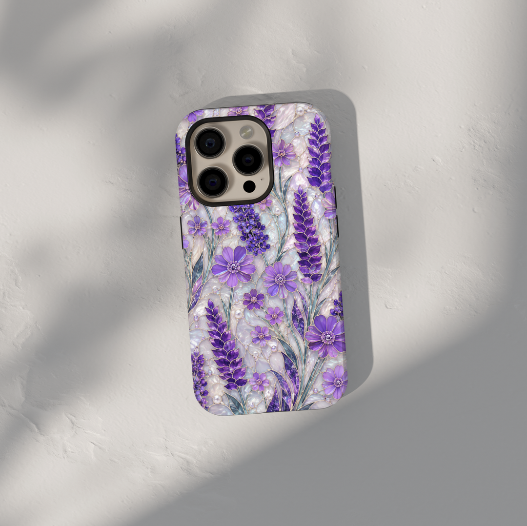 Purple lavender floral iPhone case featuring lilac wildflowers, pearl accents, botanical artwork, and elegant cottagecore aesthetic.