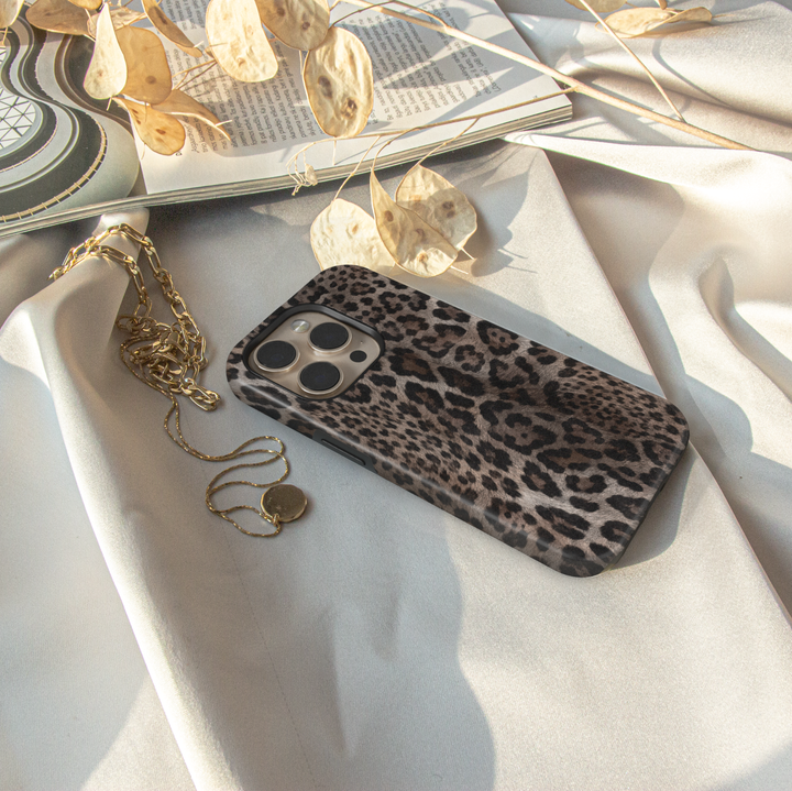 Smoky Leopard iPhone case featuring realistic taupe, brown, charcoal and black leopard animal print.