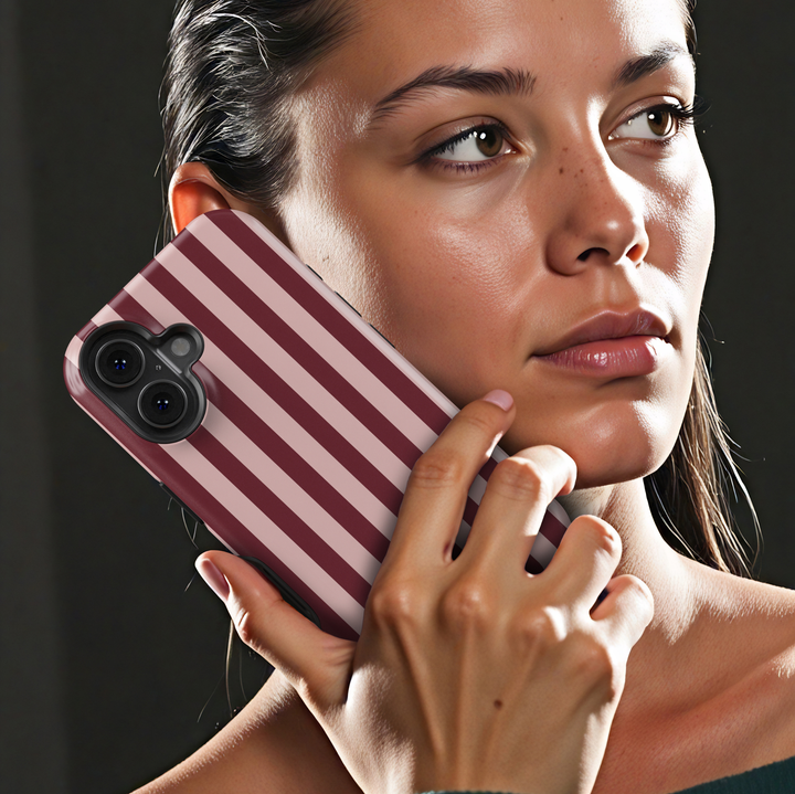 First Class burgundy striped iPhone 18 Pro Max MagSafe case featuring deep burgundy, wine red and muted blush pink vertical stripes, an elegant preppy protective tough iPhone 18 Pro phone case with a minimalist striped design and MagSafe compatibility.