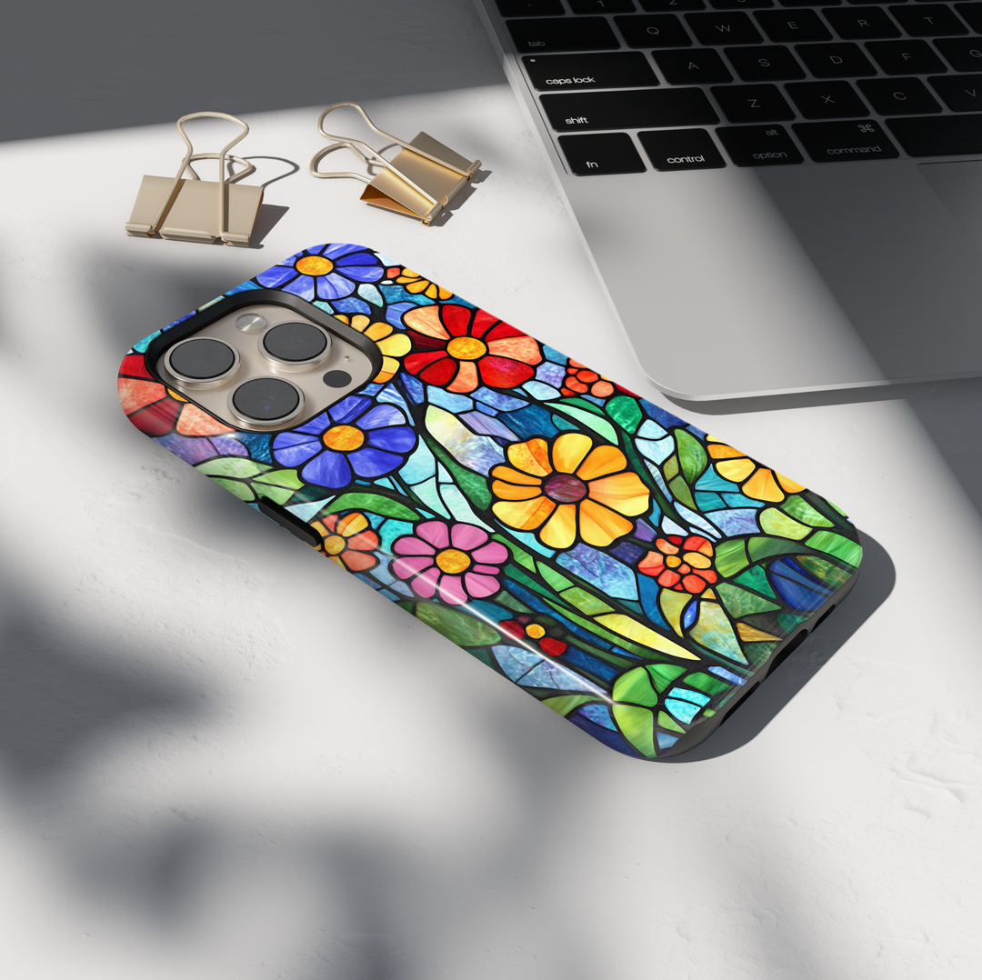 Colorful stained glass floral iPhone tough case with layered flowers and deep blue mosaic background