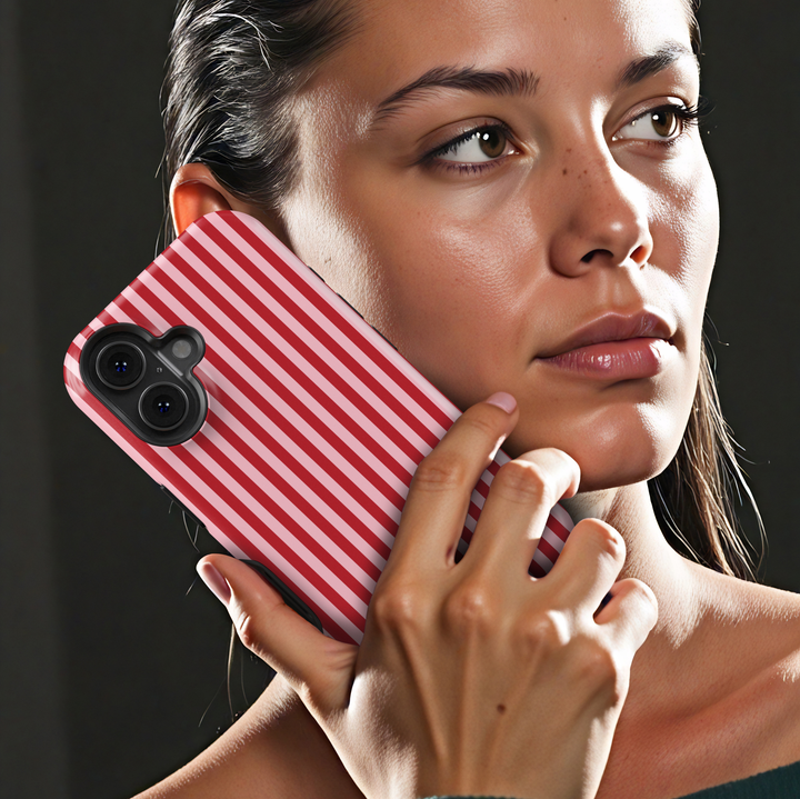 Candy Striper red and pink striped iPhone 18 Pro Max MagSafe case featuring alternating cherry red and soft blush pink vertical stripes, a cute preppy protective tough iPhone 18 Pro phone case with a feminine retro striped design and MagSafe compatibility.