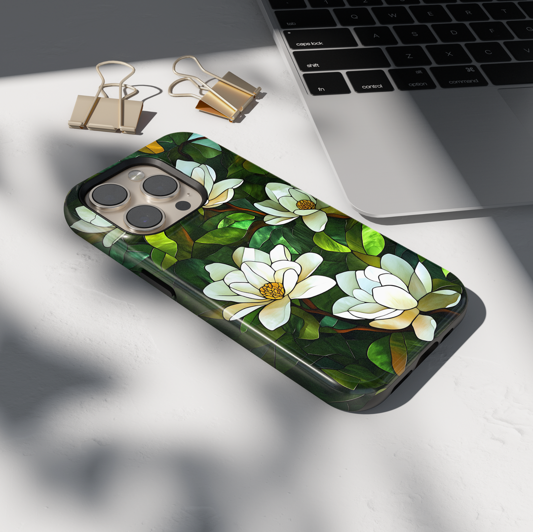Stained glass magnolia floral iPhone tough case with white flowers and layered green leaves