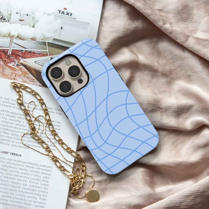 Out of Line abstract blue iPhone 18 Pro Max MagSafe case featuring curved cornflower blue line art over a soft powder blue background, a minimalist modern protective tough iPhone 18 Pro phone case with an aesthetic geometric line pattern and MagSafe compatibility.