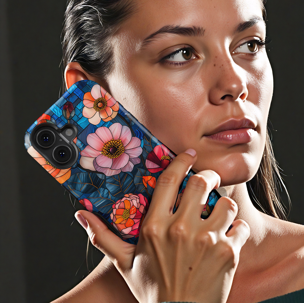 Colorful stained glass floral iPhone tough case with layered flowers and deep blue mosaic background