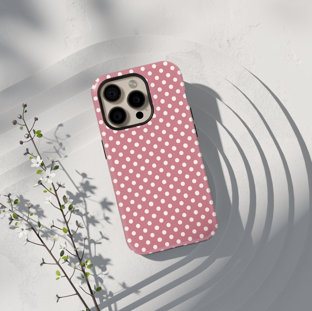 Dusty rose pink polka dot personalized phone case with custom name on a protective iPhone and Samsung Galaxy phone case