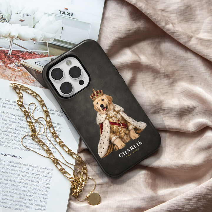 Custom royal pet phone case featuring personalized dog and cat portraits transformed into king and queen artwork on premium protective phone cases with navy, burgundy, and emerald backgrounds.