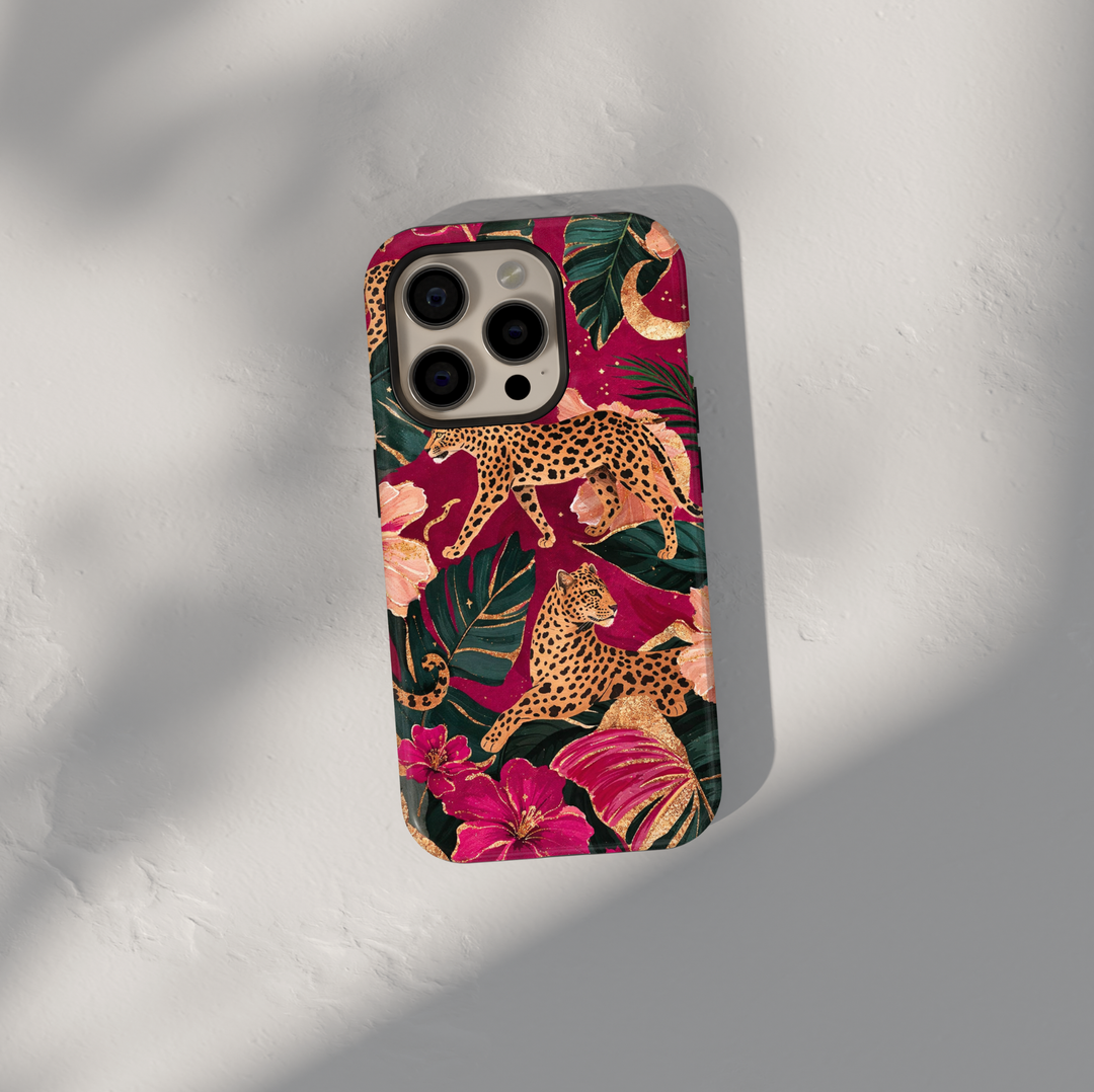 Leopard floral jungle phone case with pink flowers and green leaves aesthetic girly luxury case for iPhone 17 Pro Max and Samsung Galaxy S26 Ultra.