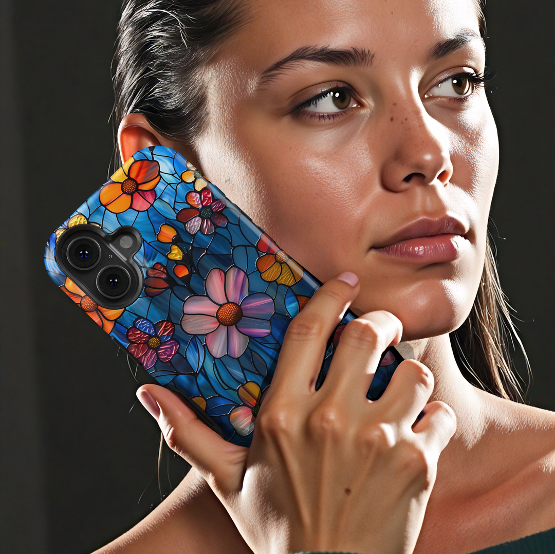 Colorful stained glass floral iPhone tough case with vibrant flowers and deep blue background