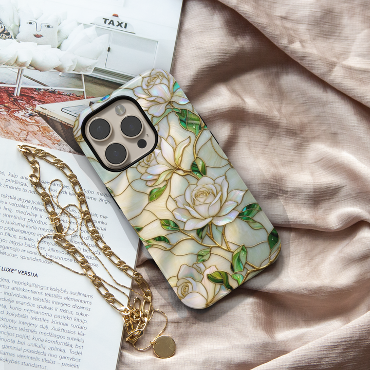Ivory floral iPhone 17 Pro Max case with pearl background and gold outlined roses, aesthetic MagSafe tough case.
