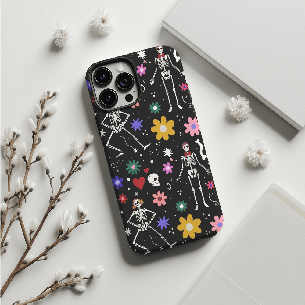 Protect your phone in style this fall with our Halloween-themed cases, including options for Pixel 8, Pixel 8 Pro, iPhone SE, iPhone 14 MagSafe, iPhone 15 MagSafe, and Samsung S24 Ultra. Perfect as a spooky gift, our goth-inspired designs like the Skull Shadows and Midnight Bones add a unique touch to your device. Don't miss our Fall iPhone cases and Halloween garland patterns!